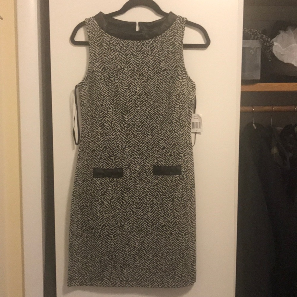 Dress with leather details